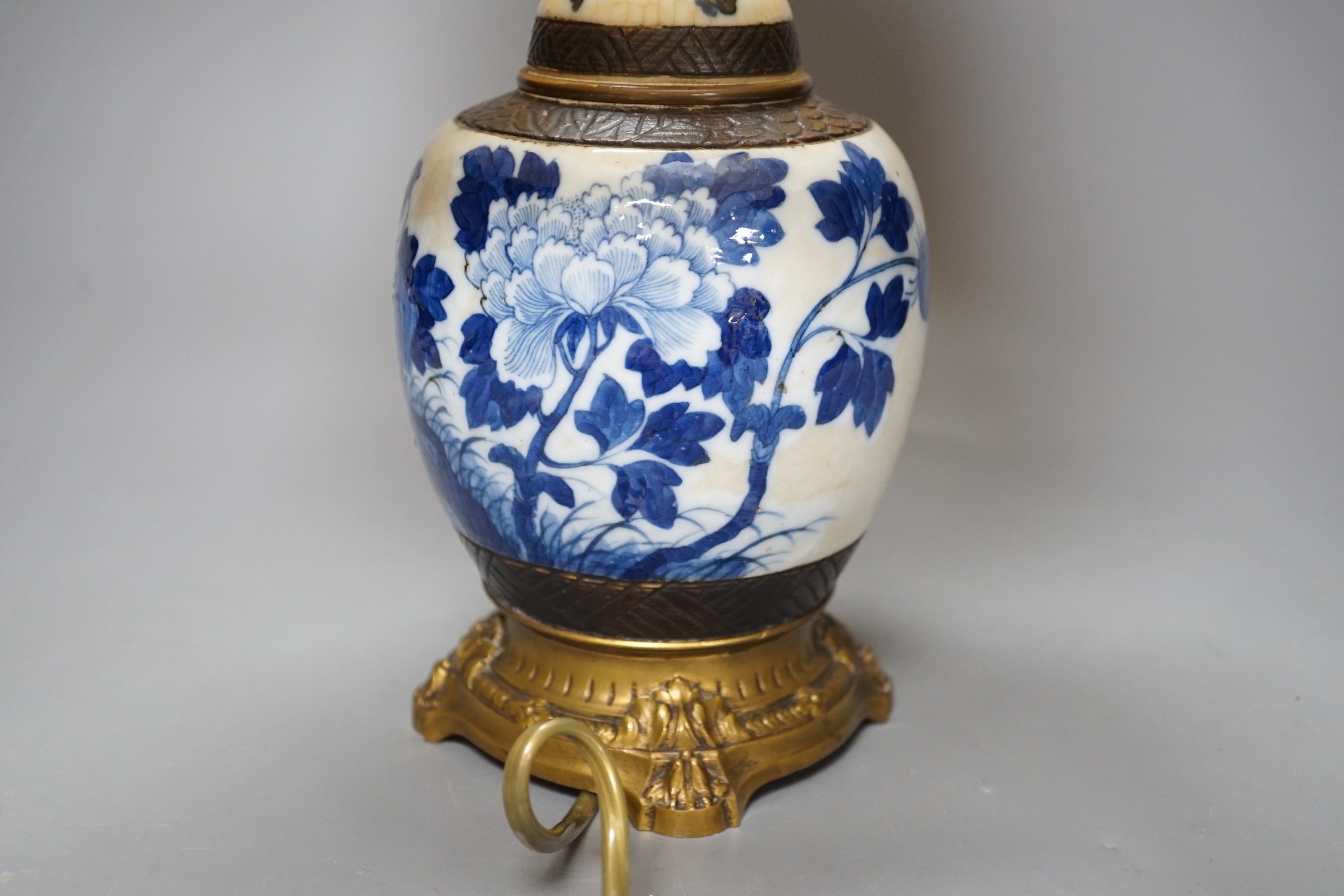 A late 19th century Chinese blue and white crackle glaze jar, now mounted as a lamp, total height 38cm